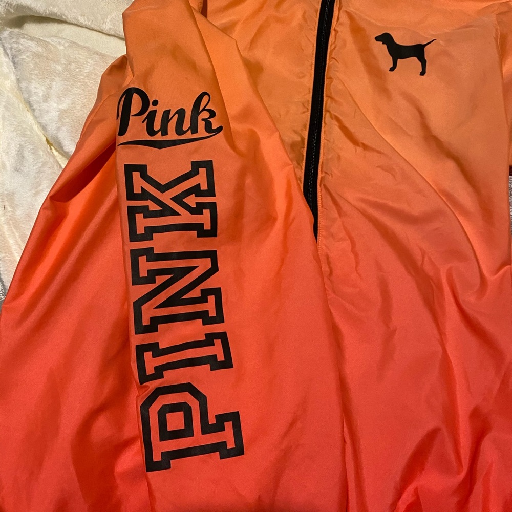 Pink windbreaker in new condition